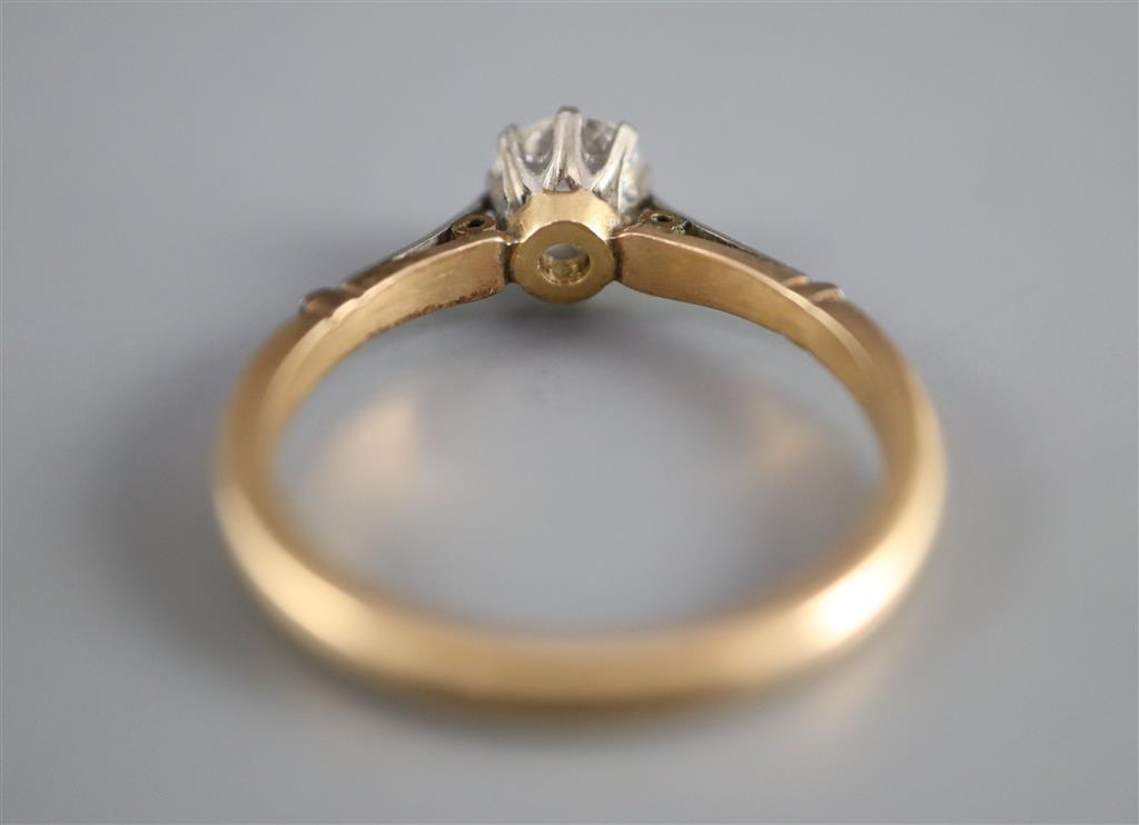 An 18ct gold and platinum, solitaire diamond ring,